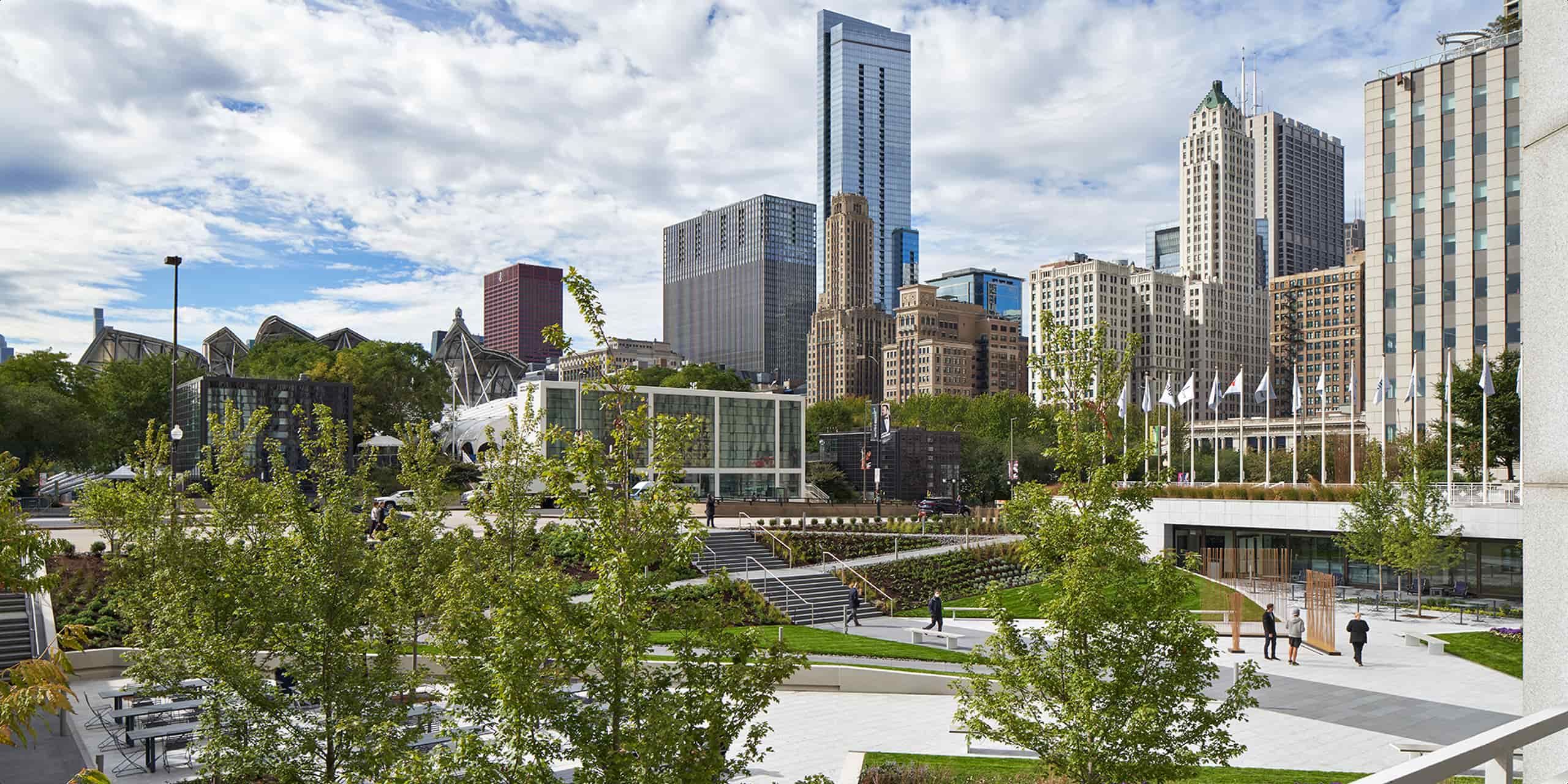 A recently redesigned plaza featuring a park-like accessible green space